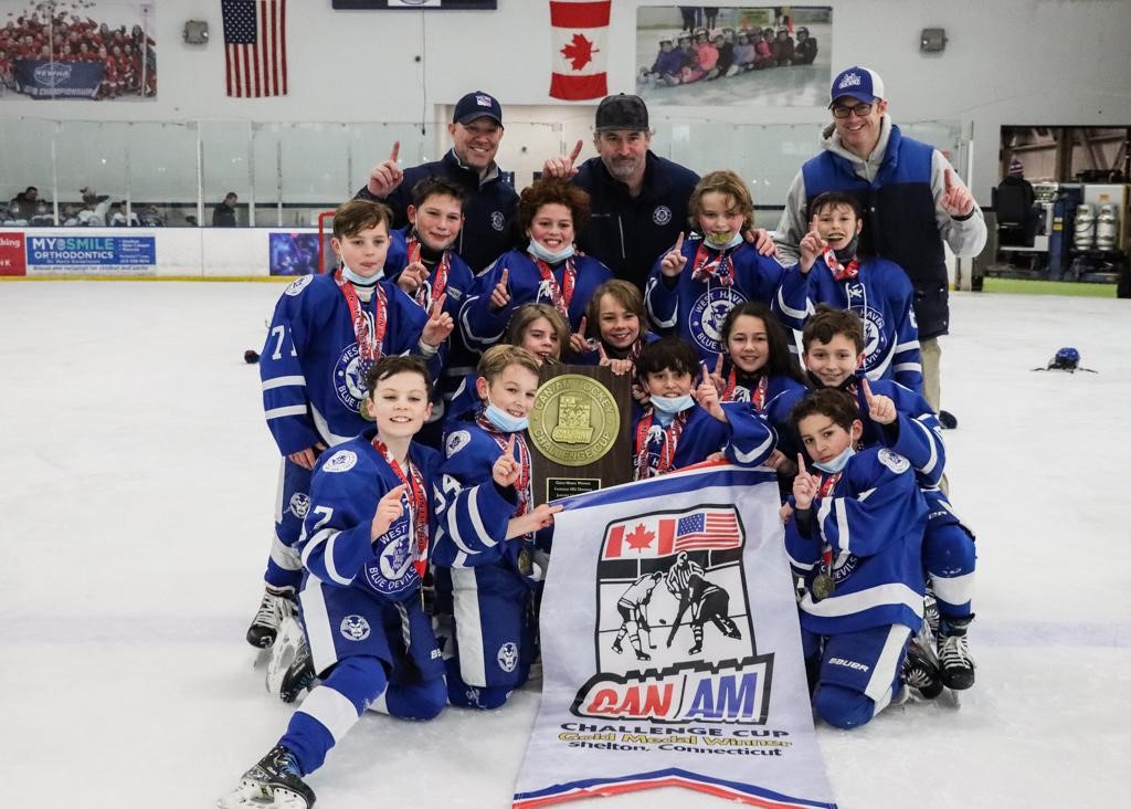 Squirt AA wins CanAm Tournament crown